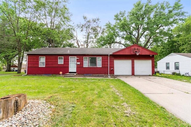 6014 Kentucky Rd, Raytown, MO 64133 - ranch-style home with a garage, concrete driveway, a front yard, and entry steps