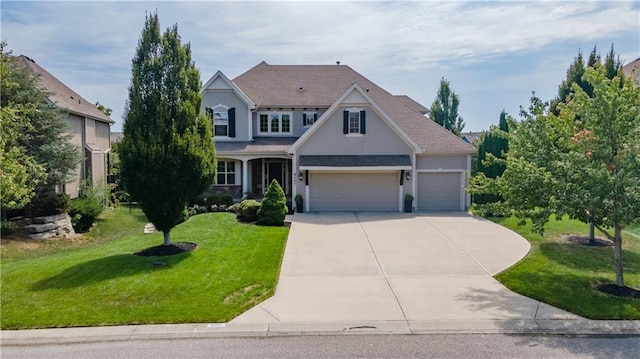 9101 W 158th St, Overland Park, KS 66221 - traditional-style house featuring driveway, an attached garage, stucco siding, and a front lawn