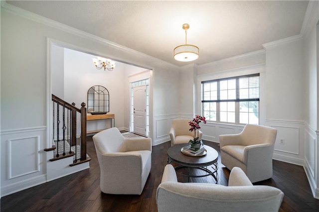 9101 W 158th St, Overland Park, KS 66221 - living room featuring stairs, a decorative wall, a chandelier, dark wood finished floors, and wainscoting