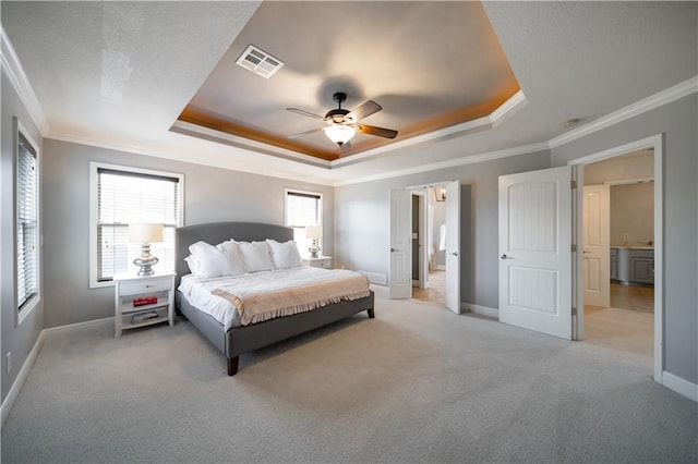 9101 W 158th St, Overland Park, KS 66221 - bedroom featuring a tray ceiling, crown molding, light carpet, and baseboards