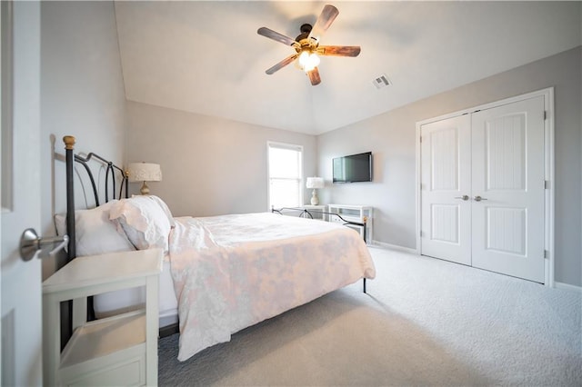 9101 W 158th St, Overland Park, KS 66221 - bedroom featuring carpet flooring, a closet, baseboards, a ceiling fan, and vaulted ceiling