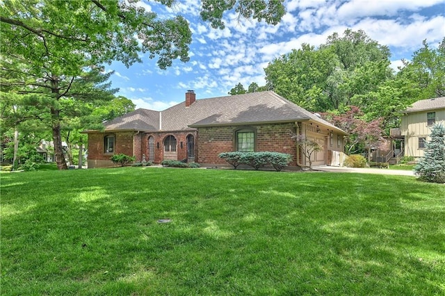 12614 Ensley Ln, Leawood, KS 66209 - single story home featuring a garage, brick siding, and a front yard