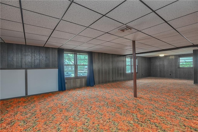 12614 Ensley Ln, Leawood, KS 66209 - below grade area featuring carpet flooring, healthy amount of natural light, a paneled ceiling, and wooden walls