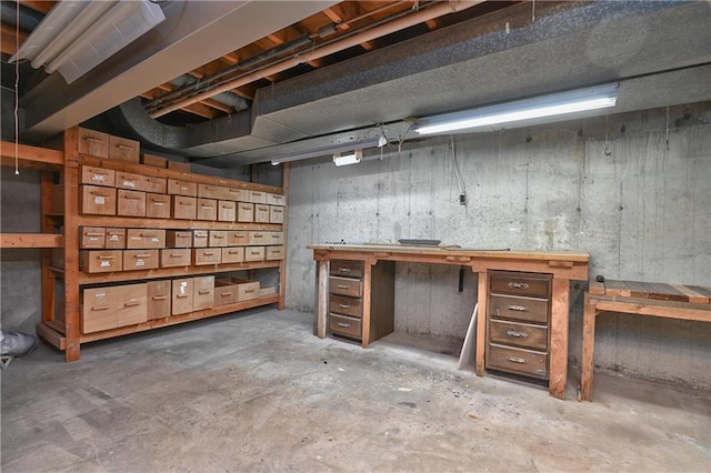 12614 Ensley Ln, Leawood, KS 66209 - unfinished below grade area with a workshop area