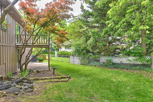12614 Ensley Ln, Leawood, KS 66209 - view of yard with central AC unit and a wooden deck