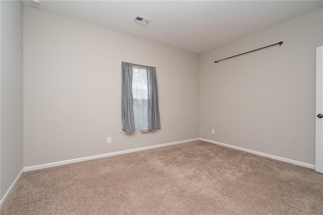 720 S Funston St, Ottawa, KS 66067 - carpeted empty room featuring baseboards
