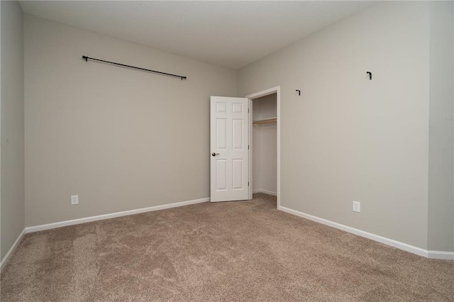 720 S Funston St, Ottawa, KS 66067 - unfurnished bedroom featuring carpet floors and baseboards