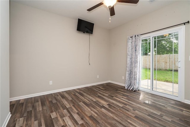 720 S Funston St, Ottawa, KS 66067 - spare room with wood finished floors, a ceiling fan, and baseboards