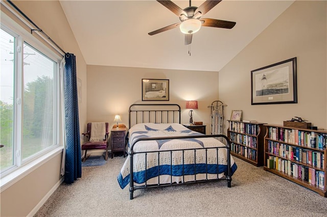 214 N Mcgee St, Tonganoxie, KS 66086 - bedroom featuring vaulted ceiling, carpet floors, multiple windows, baseboards, and a ceiling fan