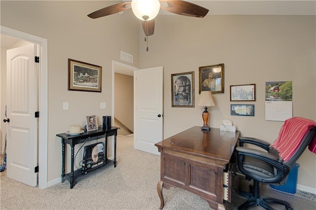 214 N Mcgee St, Tonganoxie, KS 66086 - carpeted home office with ceiling fan, a high ceiling, and baseboards