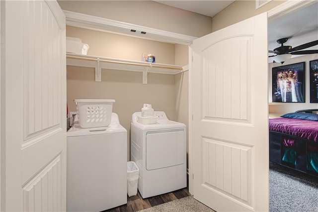 214 N Mcgee St, Tonganoxie, KS 66086 - laundry room with separate washer and dryer and wood finished floors
