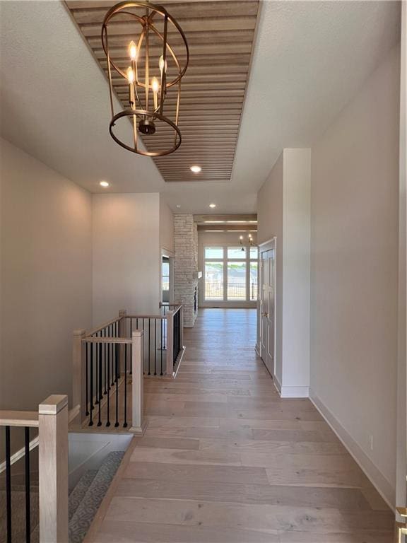 16311 Mustang St, Gardner, KS 66030 - hall featuring an upstairs landing, a chandelier, light wood-type flooring, baseboards, and recessed lighting