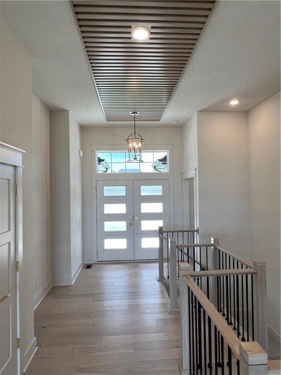 16311 Mustang St, Gardner, KS 66030 - entryway featuring light wood-type flooring and baseboards