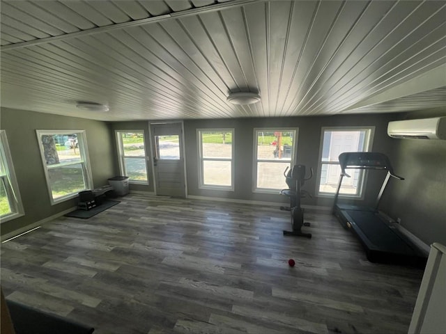 344 E 520th Ave, Pittsburg, KS 66762 - unfurnished sunroom featuring a wall mounted AC and healthy amount of natural light