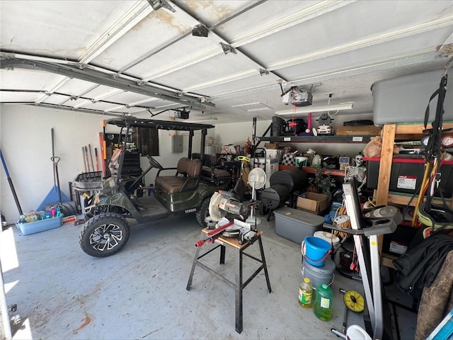344 E 520th Ave, Pittsburg, KS 66762 - garage featuring a garage door opener