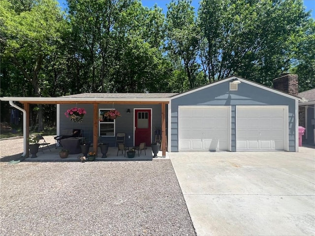 344 E 520th Ave, Pittsburg, KS 66762 - garage with driveway
