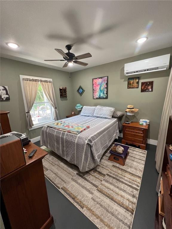 344 E 520th Ave, Pittsburg, KS 66762 - bedroom featuring a wall mounted AC, baseboards, ceiling fan, and recessed lighting