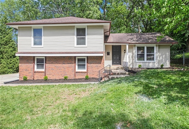 12309 Askew Dr, Grandview, MO 64030 - tri-level home with brick siding and a shingled roof