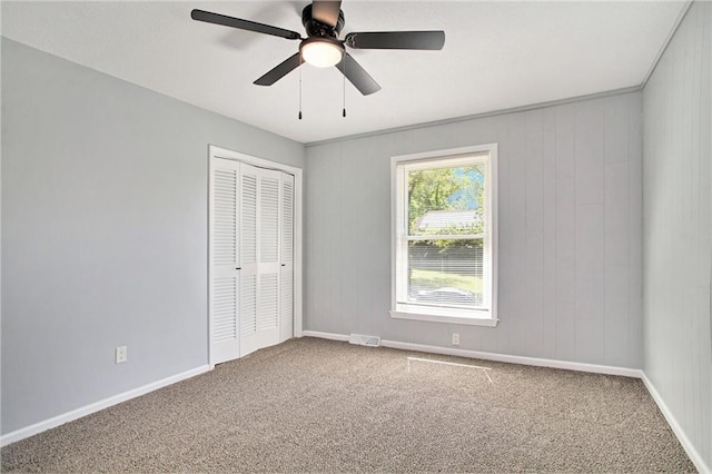 12309 Askew Dr, Grandview, MO 64030 - unfurnished bedroom with carpet, a closet, and baseboards