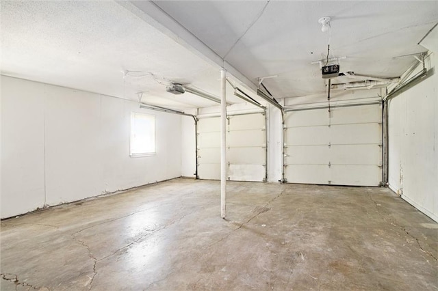 12309 Askew Dr, Grandview, MO 64030 - garage featuring a garage door opener