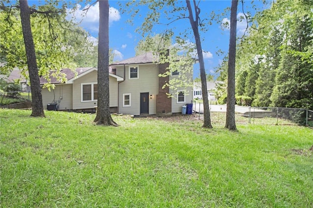 12309 Askew Dr, Grandview, MO 64030 - back of property with central air condition unit