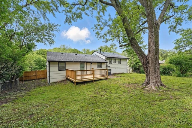 10217 Wheeling Ave, Kansas City, MO 64134 - rear view of house with a deck and central AC unit