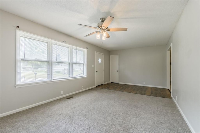 1221 Sunset St, Chillicothe, MO 64601 - carpeted spare room with a ceiling fan and baseboards