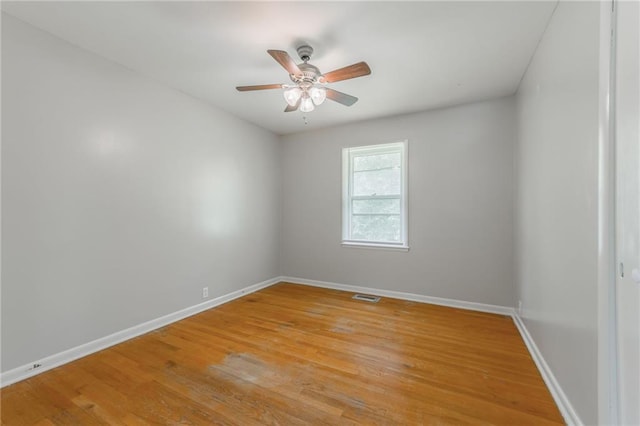 1221 Sunset St, Chillicothe, MO 64601 - empty room featuring baseboards, light wood finished floors, and ceiling fan