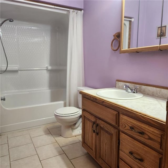 411 Briarwood Dr, Iola, KS 66749 - full bathroom with vanity, shower / bath combo with shower curtain, tile patterned flooring, and toilet