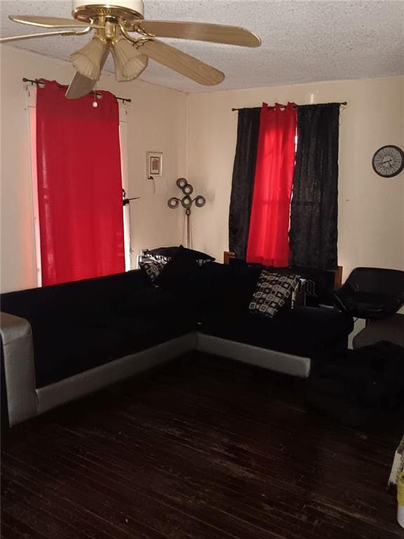 2539 Kensington Ave, Kansas City, MO 64127 - living room with a ceiling fan, hardwood / wood-style flooring, and a textured ceiling