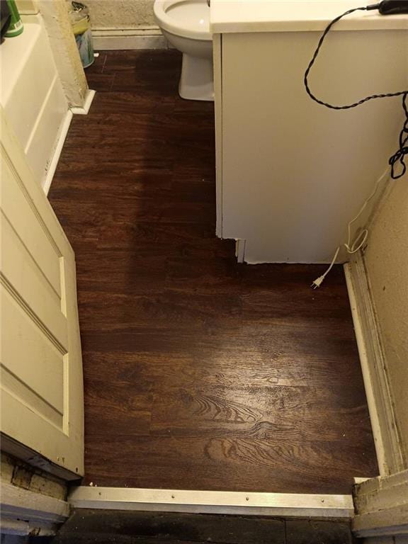 2539 Kensington Ave, Kansas City, MO 64127 - bathroom view of wood finished floors and toilet