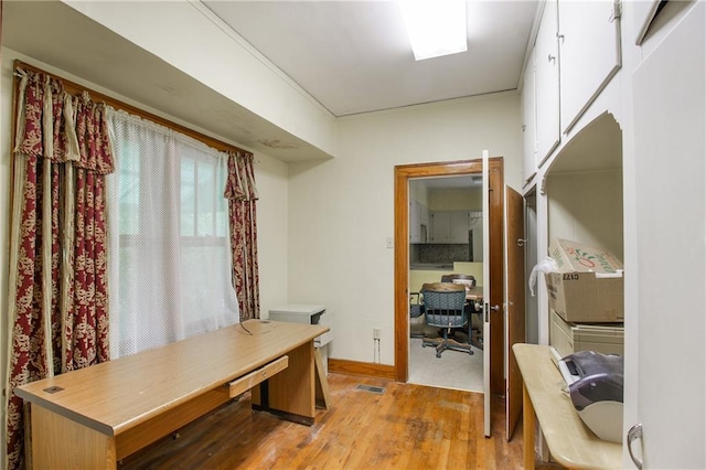 1601 Stevens Ave, Parsons, KS 67357 - home office featuring light wood-style flooring