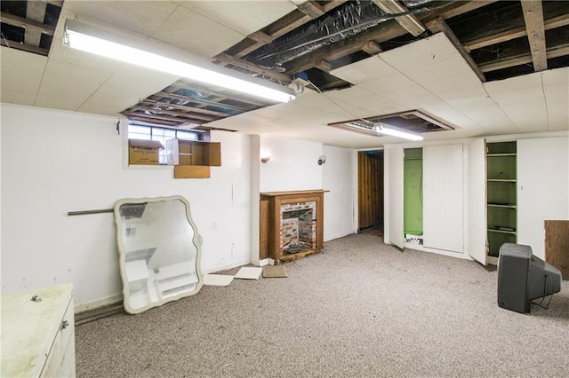 1601 Stevens Ave, Parsons, KS 67357 - basement with carpet flooring and baseboards