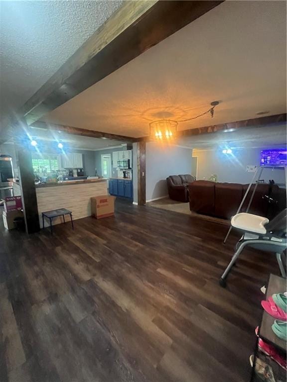 933 1300th St, Iola, KS 66749 - living area featuring dark wood-type flooring