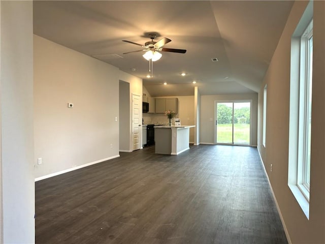 37818 W 207th Ter, Edgerton, KS 66021 - unfurnished living room featuring vaulted ceiling, ceiling fan, and dark wood-style floors