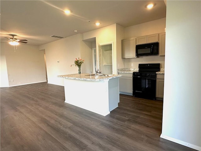 37818 W 207th Ter, Edgerton, KS 66021 - kitchen with black appliances, ceiling fan, dark wood-style floors, a center island with sink, and recessed lighting