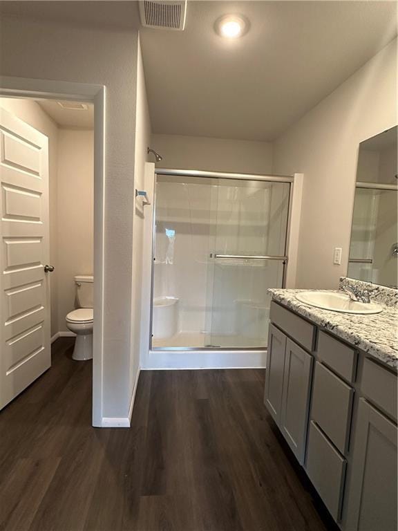 37818 W 207th Ter, Edgerton, KS 66021 - full bath with a shower stall, wood finished floors, and vanity
