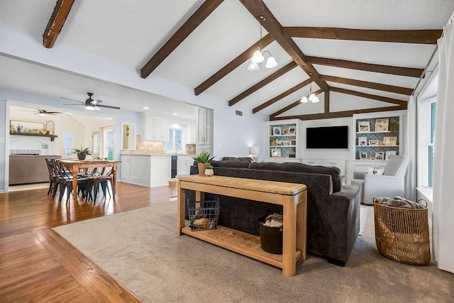 33991 Mission Belleview Rd, Louisburg, KS 66053 - living area featuring wood finished floors, healthy amount of natural light, and ceiling fan