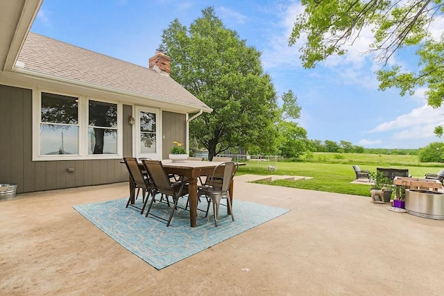 33991 Mission Belleview Rd, Louisburg, KS 66053 - view of patio featuring outdoor dining area