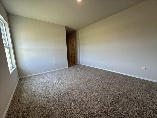 37779 W 207th Ter, Edgerton, KS 66021 - empty room with carpet flooring and baseboards