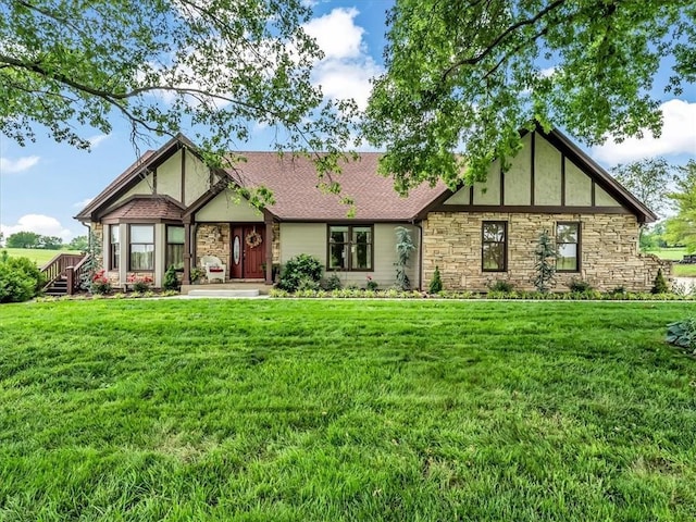 12806 33rd Hwy, Kearney, MO 64060 - tudor home featuring stone siding, a front yard, and stucco siding