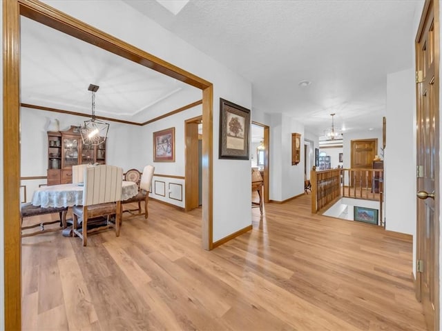 12806 33rd Hwy, Kearney, MO 64060 - dining area featuring a chandelier and light wood-style flooring