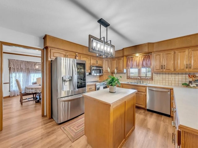 12806 33rd Hwy, Kearney, MO 64060 - kitchen with stainless steel appliances, a sink, light countertops, and tasteful backsplash