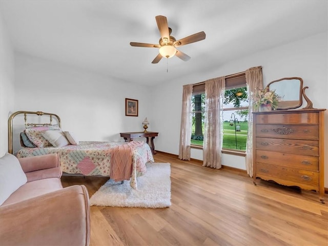 12806 33rd Hwy, Kearney, MO 64060 - bedroom featuring light wood finished floors and a ceiling fan