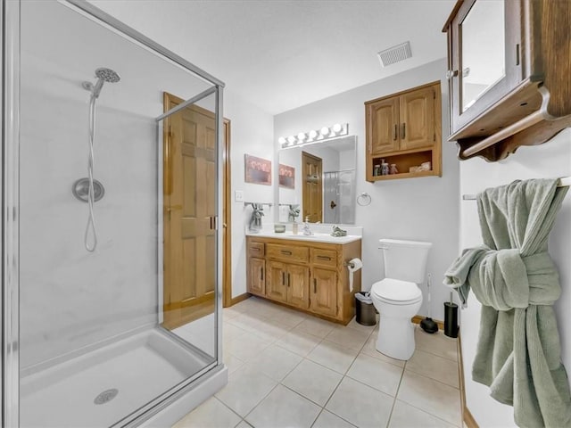 12806 33rd Hwy, Kearney, MO 64060 - bathroom featuring a stall shower, vanity, tile patterned floors, toilet, and baseboards