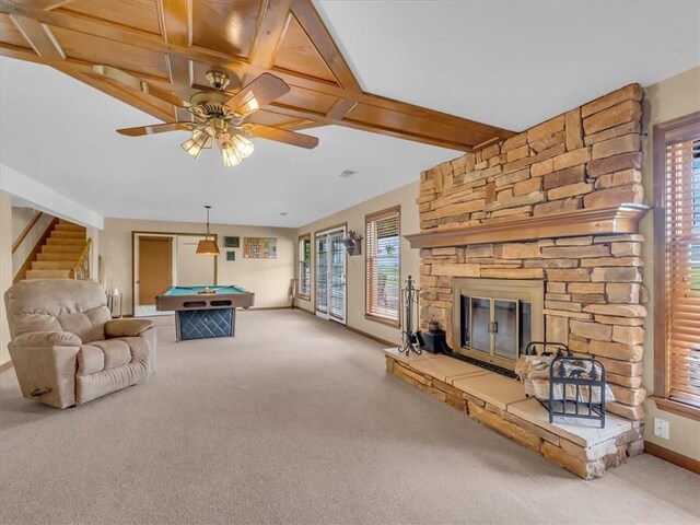 12806 33rd Hwy, Kearney, MO 64060 - carpeted living area with billiards table, a ceiling fan, healthy amount of natural light, stairway, and beam ceiling