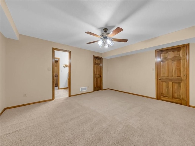 12806 33rd Hwy, Kearney, MO 64060 - unfurnished bedroom with baseboards, light carpet, and ceiling fan