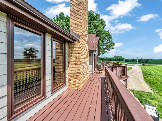 12806 33rd Hwy, Kearney, MO 64060 - wooden terrace with outdoor dining space