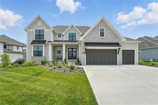 17137 Barton St, Overland Park, KS 66221 - view of front of house featuring a standing seam roof, a front yard, concrete driveway, and french doors