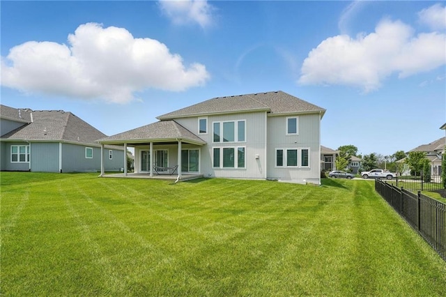 17137 Barton St, Overland Park, KS 66221 - back of house featuring a patio